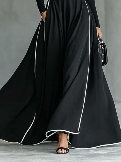 Vestido largo ajustado para mujer con cuello alto, mangas largas, costuras negras y ribete blanco con cinturón