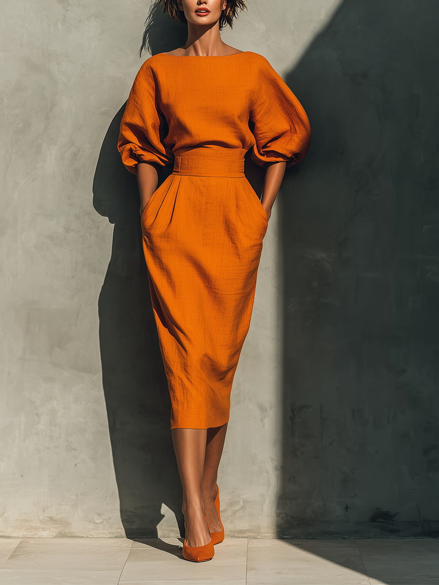 Conjunto de blusa naranja de manga media y falda midi