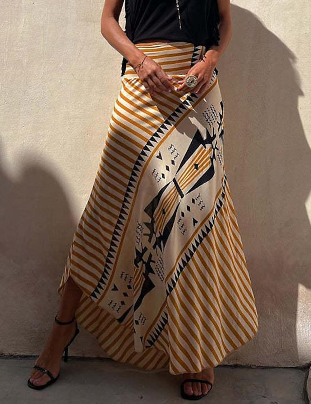 Falda maxi irregular con estampado de empalme de rayas de cintura alta