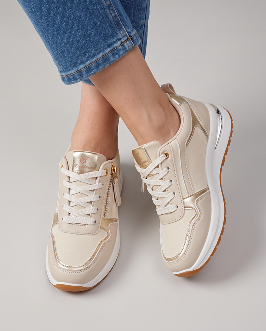 Zapatillas cómodas con cremallera y detalles metalizados