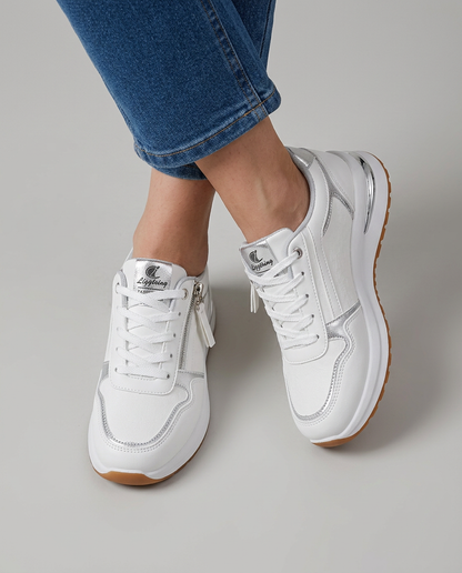 Zapatillas cómodas con cremallera y detalles metalizados